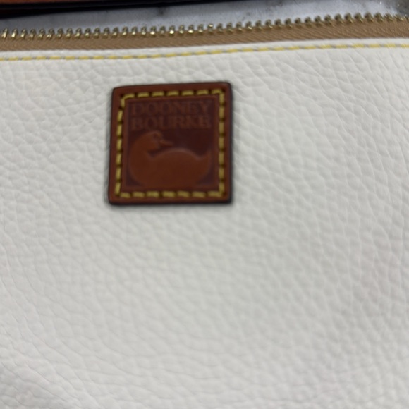 ￼New without tag Dooney and Bourke large wristlet wallet. Creamy white. - Picture 2 of 9